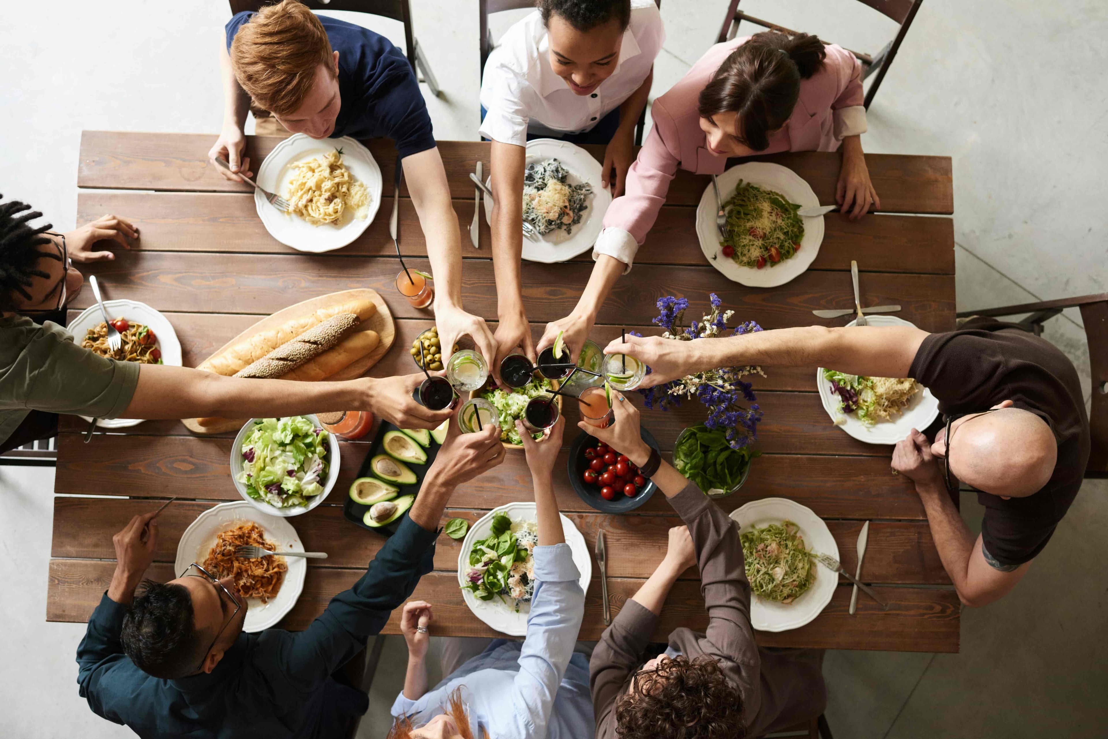 People having dinner together